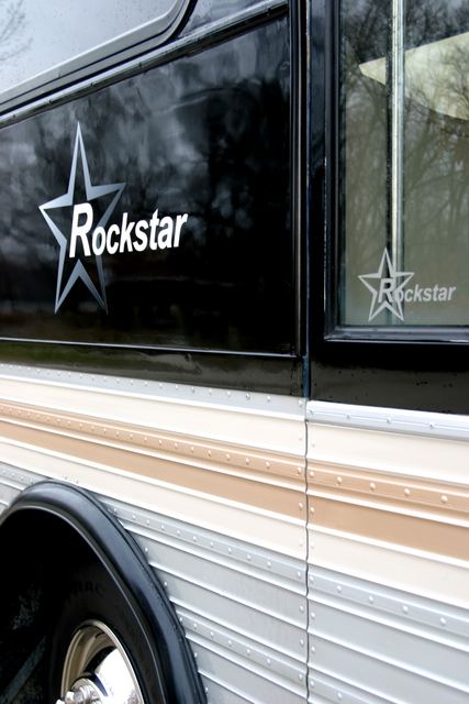 Star logo on a tinted window