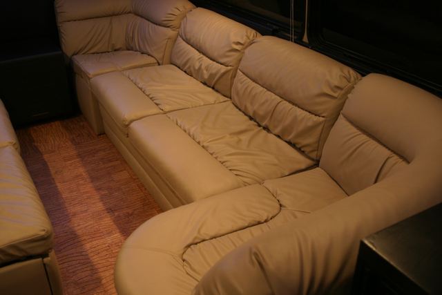 Corner of the couch with wood floor