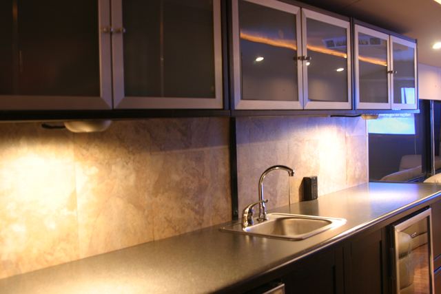 Bar cabinets and sink under cabinet lighting