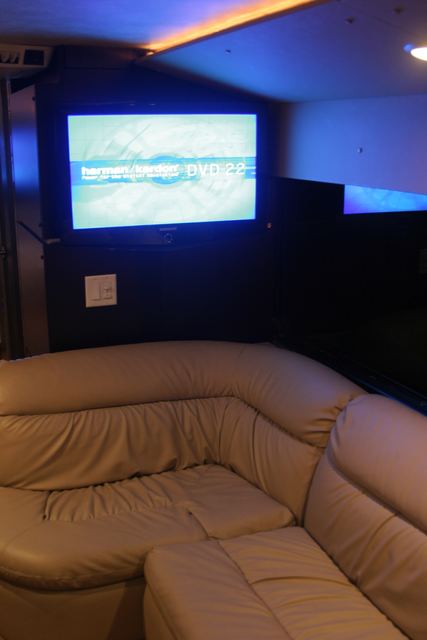 Flat panel above the leather seating