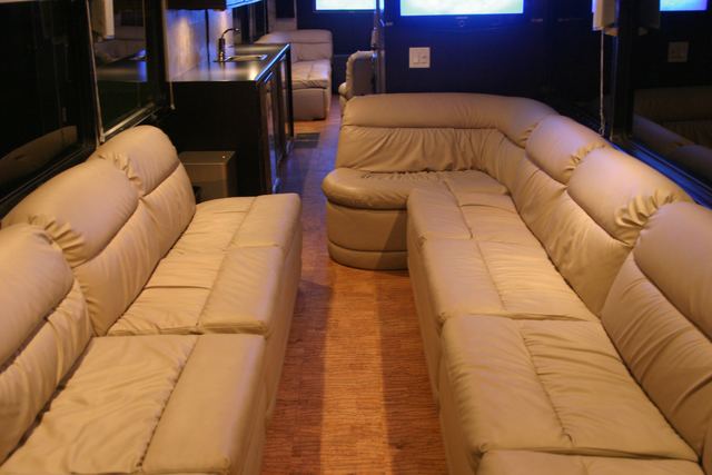 Couch seating with a screen at the far end